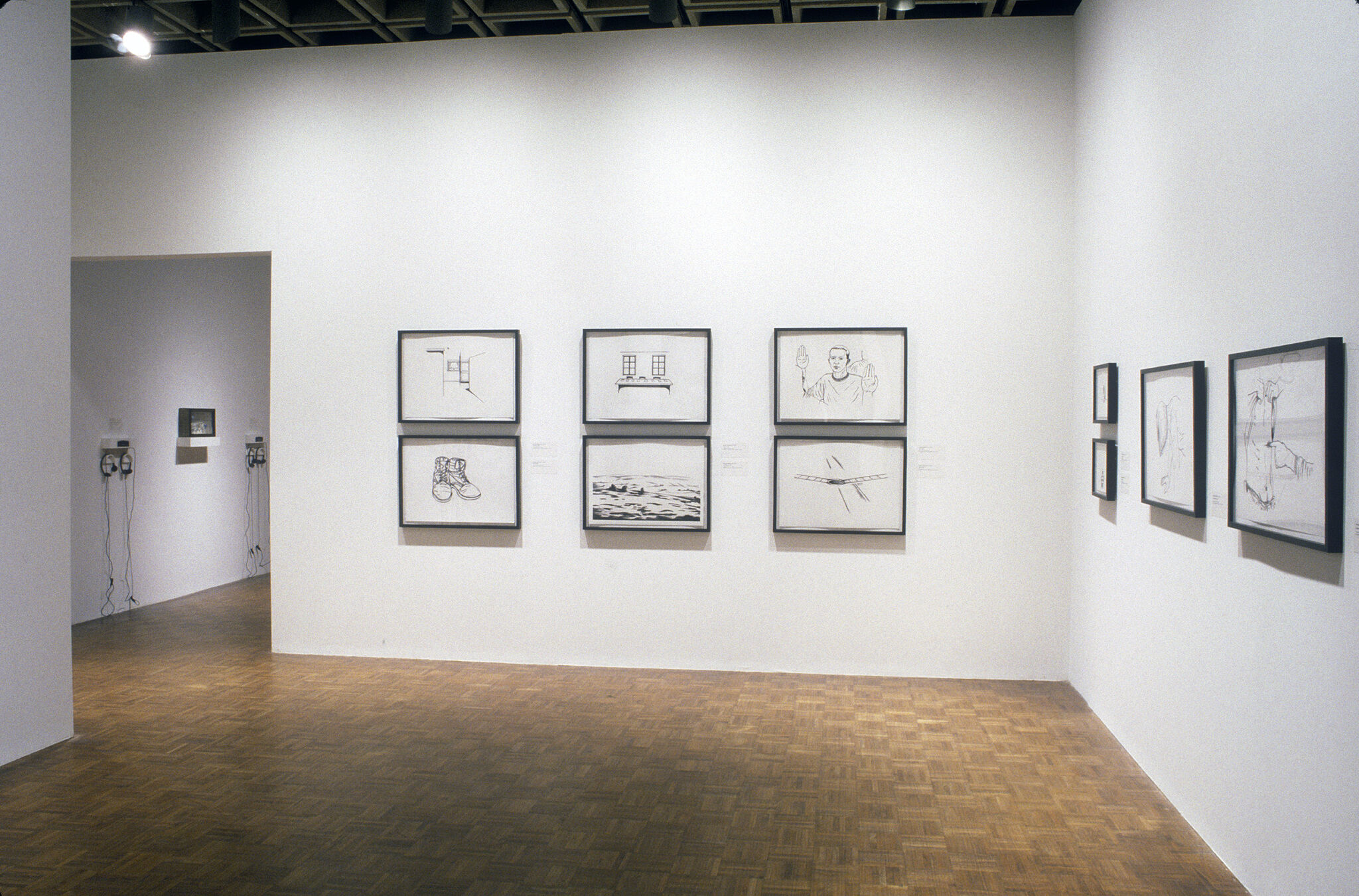 A gallery filled drawings displayed on the walls.